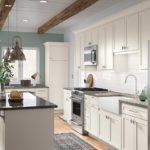 White Shaker Kitchen Cabinets with Island and Built-in Desk - Omni Cabinet Door Style with Snow Finish By Mantra Cabinets