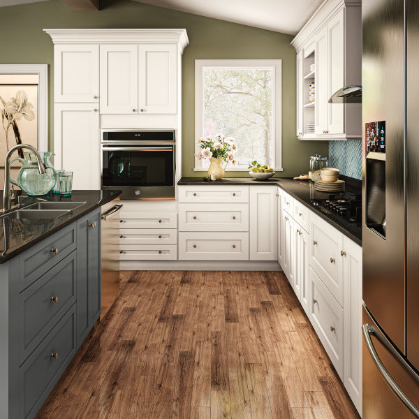 White Shaker Kitchen Cabinets and Deep Gray Island - Spectra Cabinet Door Style in Snow Finish and Omni Cabinet Door Style in Graphite Finish from Mantra Cabinets